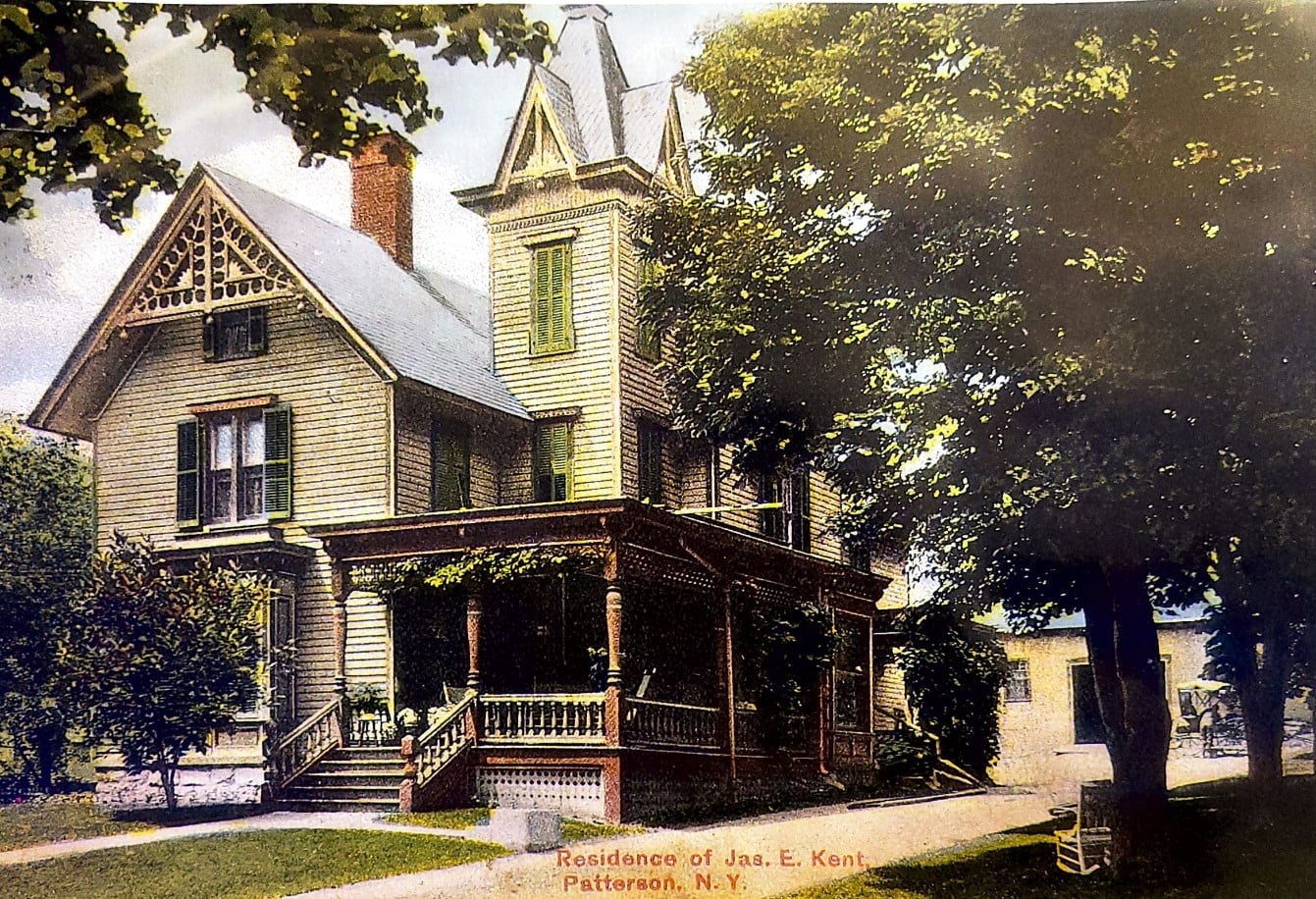 Early hand-colored postcard of the Patterson Victorian house